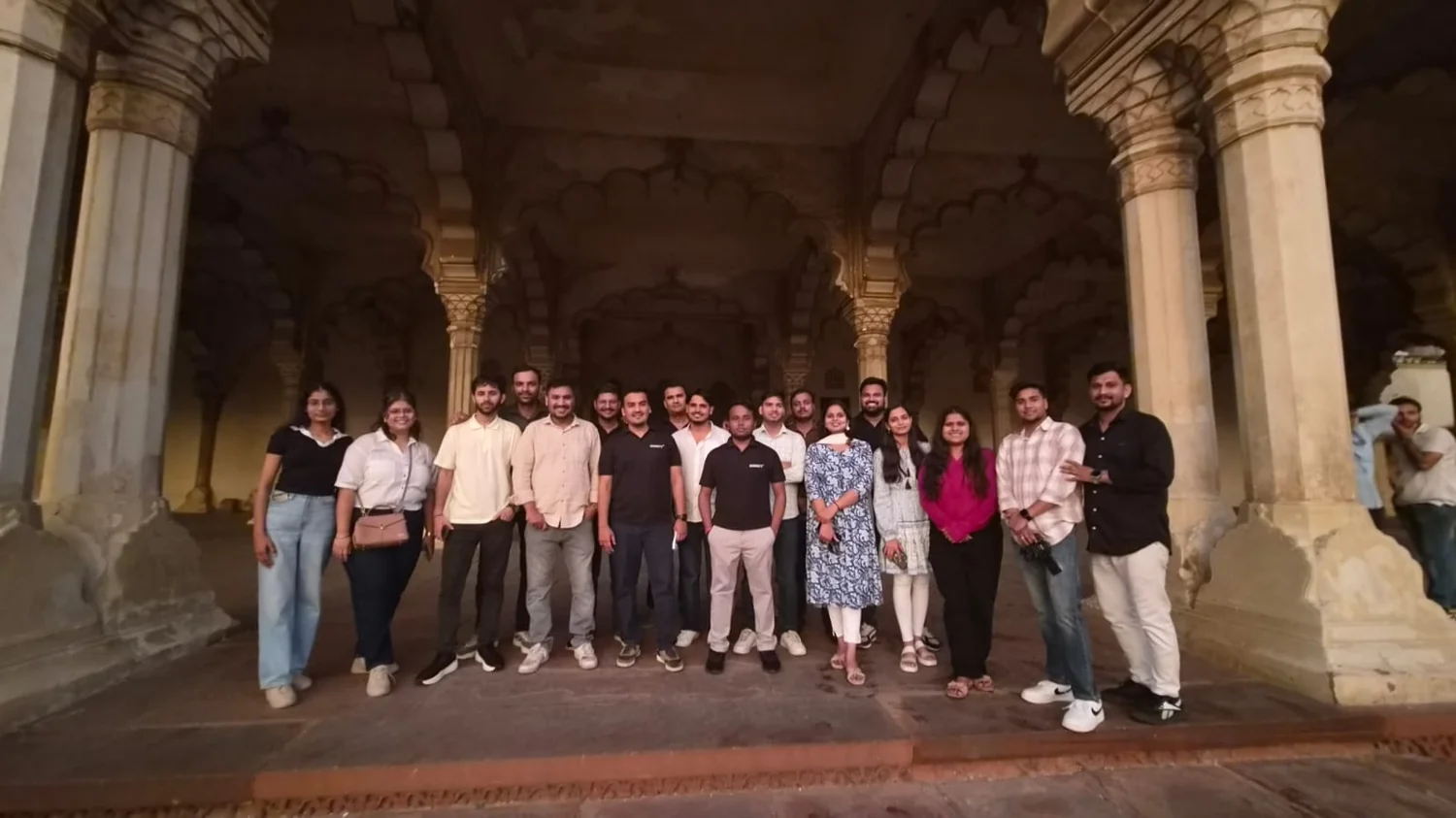 Team group photo inside heritage location